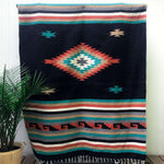 Mojave Blanket Mexican style heavy weight blanket woven in teal, rust, tan, white and grey diamond and stripe pattern with black background